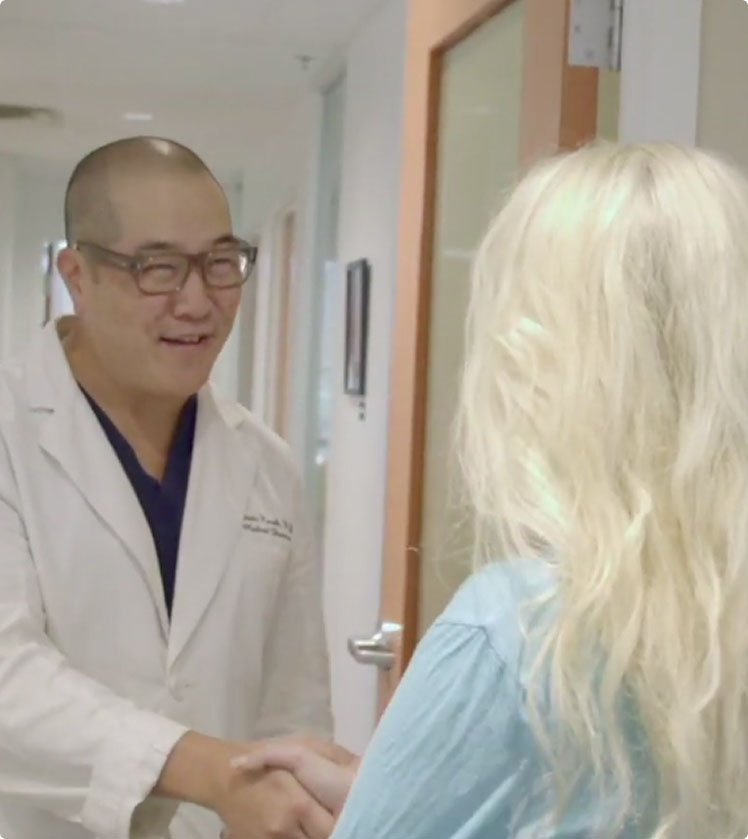 Dr. Kwak meeting a patient