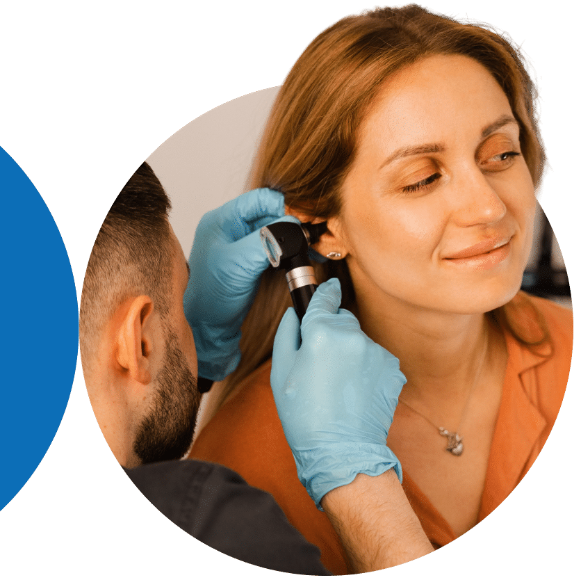 ENT doctor checking a patient ear